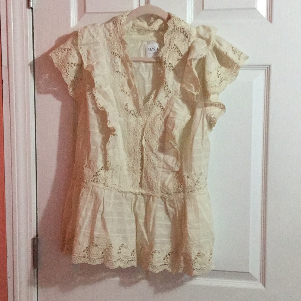 beige flowy blouse